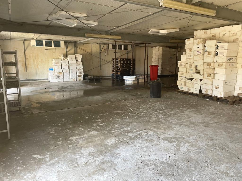 Lot: 8 - FREEHOLD COMMERCIAL OPPORTUNITY WITH POTENTIAL IN FAVOURED SOUTH DOWNS LOCATION - Portal formed storage depot on west side